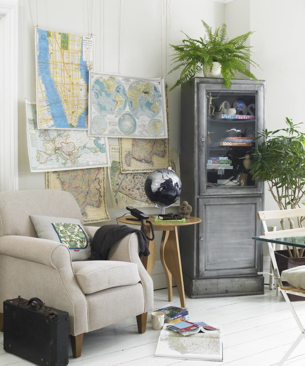 Living room with maps on a wall