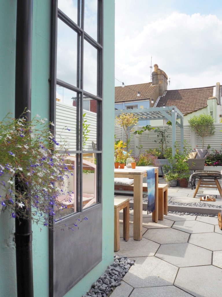 8 easy tips and tricks on how to create an outdoor garden room. From paint, to furniture to accessories - this post has got it covered. Why? Because we all want you to enjoy Summer for longer and make the most of every ray of sunshine says lifestyle blogger Maxine Brady