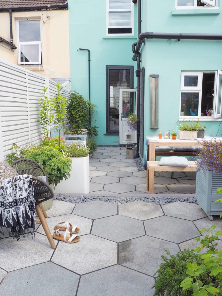 garden table, painted outdoor furniture, english garden. modern fencing, geometric paving