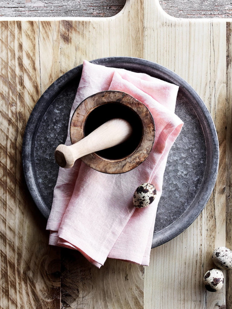 food styling with pink linen napkins and rustic wooden table