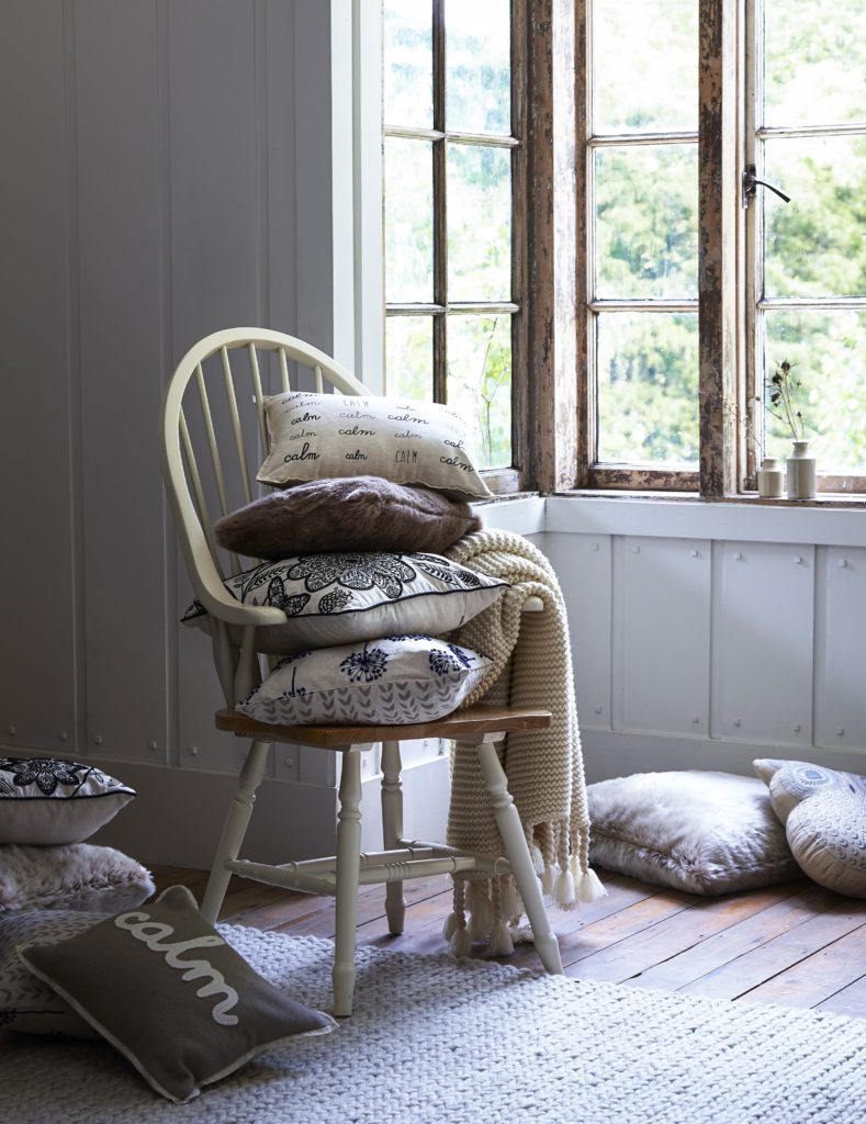 country Home styling with cushions and woolen throw by Interior Stylist Maxine Brady