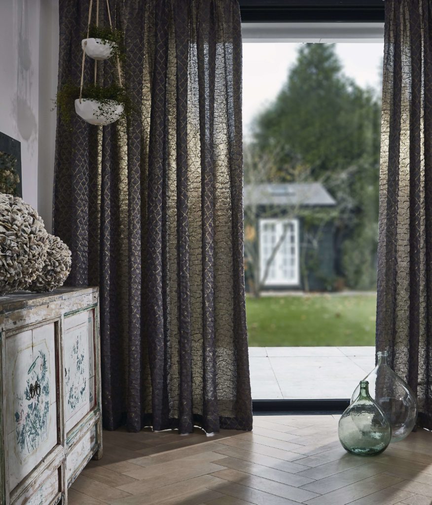Discover 4 stylish ways to dress your windows this winter with the help of Interior Stylist Maxine Brady and Couture Living. Metallic curtain at windows