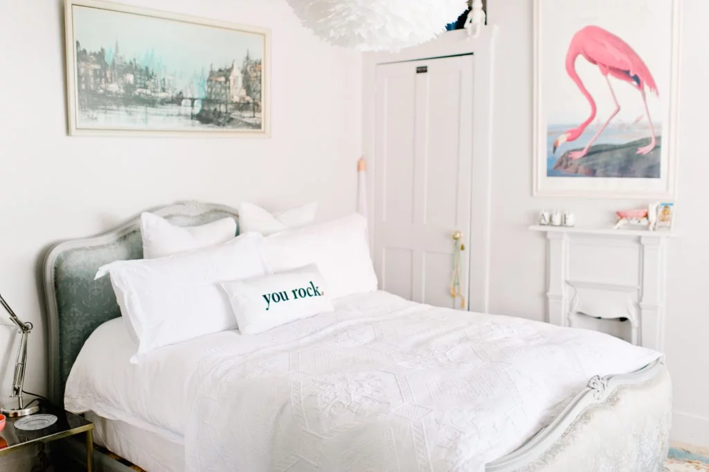 Be the first to see the plans for my bedroom makeover- (hint it has a coral wallpaper!) Pink and white bedroom with flamingo print