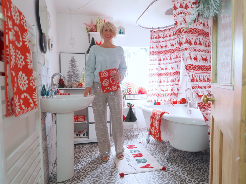 Christmas bathroom styling ideas, red and white christmas bathroom, christmas decorations, christmas bath mat, christmas shower curtain, festive bathroom, christmas towes with Triton Showers bathroom competition 