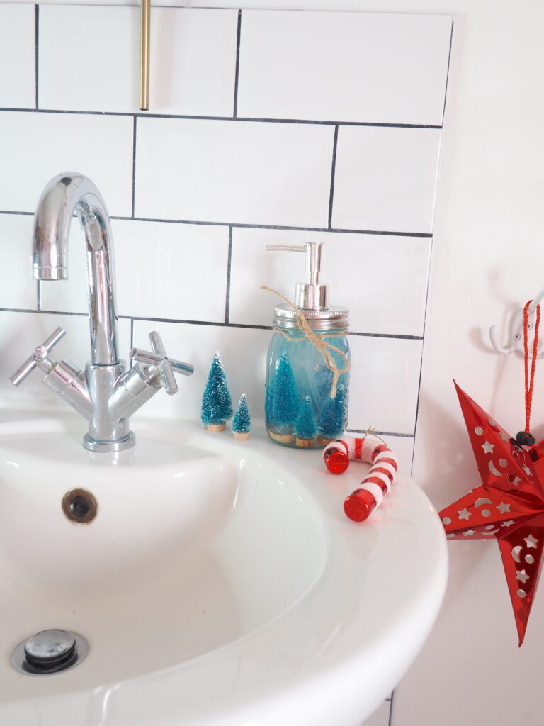 Christmas bathroom styling ideas, red and white christmas bathroom, christmas decorations, christmas bath mat, christmas shower curtain, festive bathroom, christmas towes with Triton Showers bathroom competition 