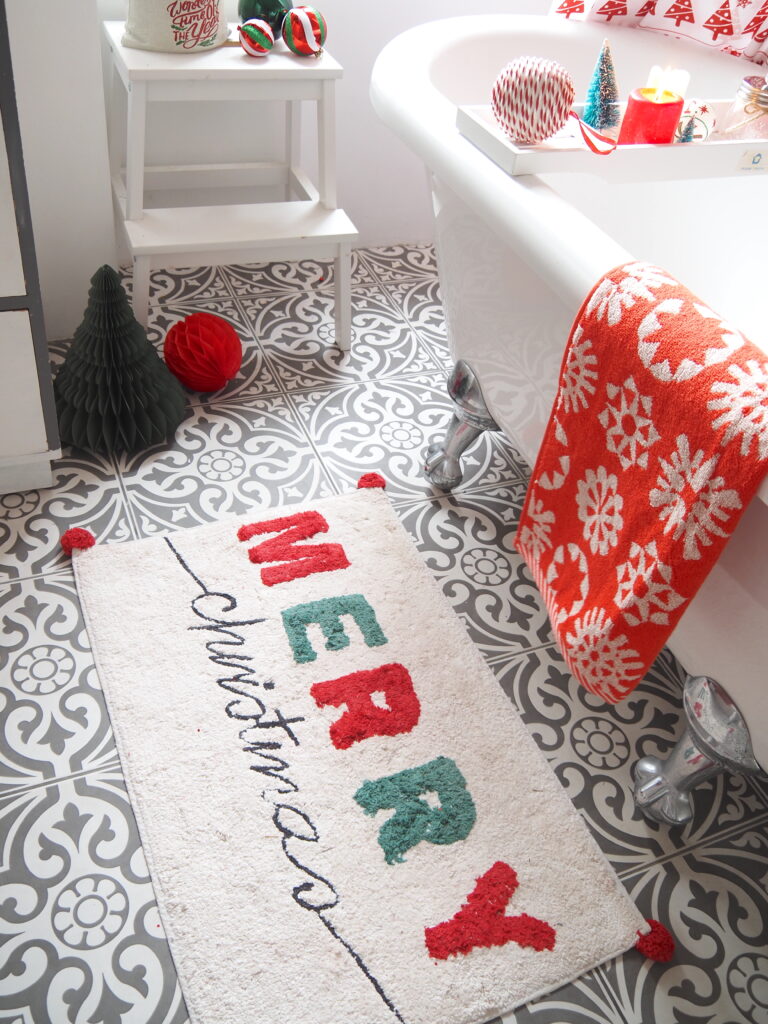 Christmas bathroom styling ideas, red and white christmas bathroom, christmas decorations, christmas bath mat, christmas shower curtain, festive bathroom, christmas towes with Triton Showers bathroom competition 