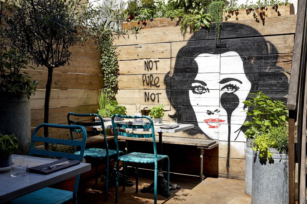As Brighton local. here are 12 of my favourites, from leafy courtyards to proper rooftop bars with sea views. 
