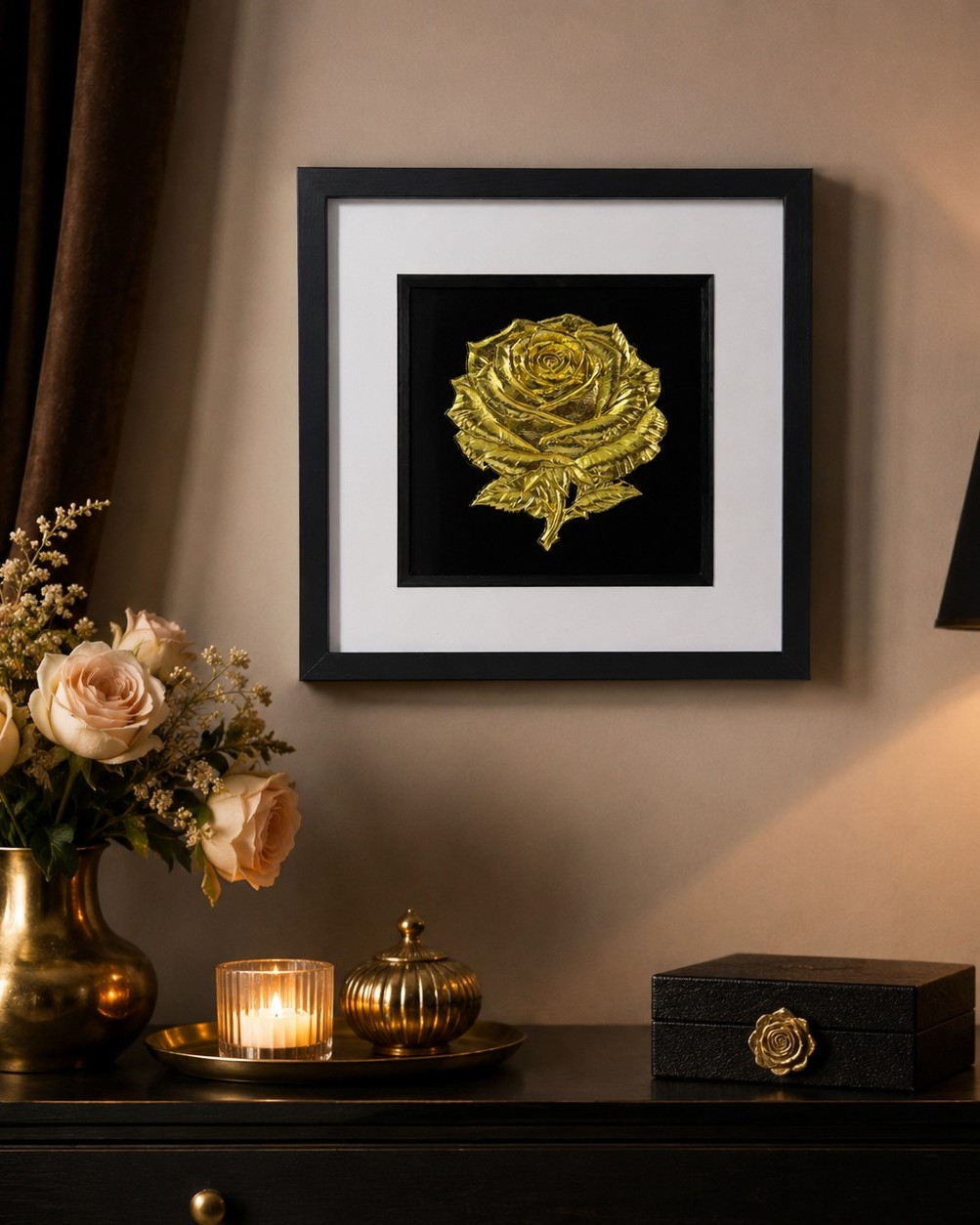 How to choose wall art for your home:. Gold rose wall art in a black frame styled with soft lighting and elegant home accessories