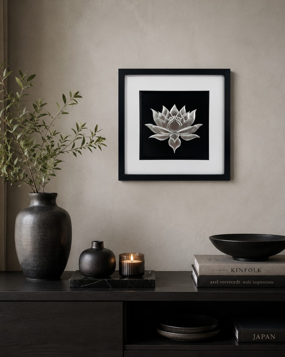 How to choose wall art for your home: Gold symbolic wall art in a black frame styled in a calm neutral home interior